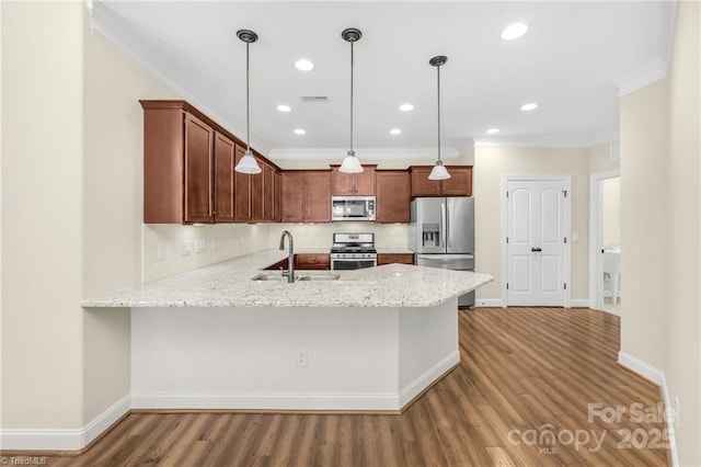 202 Watchtower Ct, Winston Salem, NC 27127 - kitchen with stainless steel appliances, a sink, light wood finished floors, backsplash, and baseboards