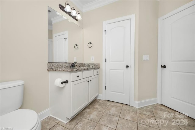 202 Watchtower Ct, Winston Salem, NC 27127 - bathroom featuring crown molding, toilet, baseboards, vanity, and tile patterned flooring