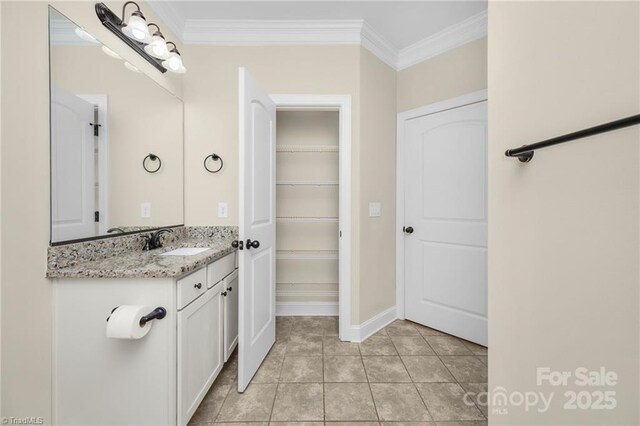 202 Watchtower Ct, Winston Salem, NC 27127 - bathroom featuring vanity, crown molding, tile patterned floors, and baseboards