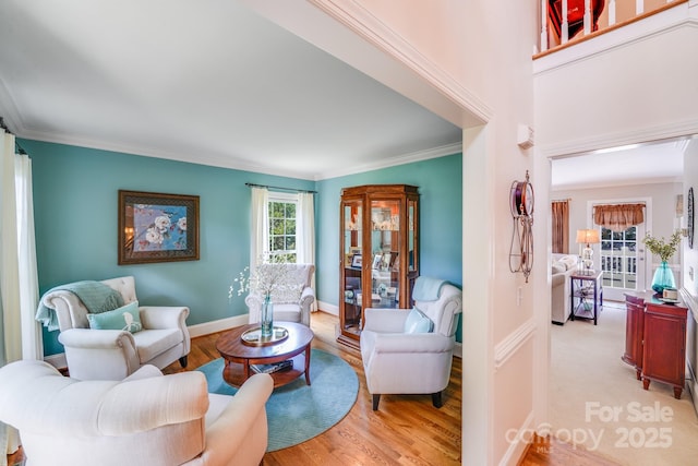 10127 Tallent Ln, Huntersville, NC 28078 - living area featuring ornamental molding, light wood-type flooring, and baseboards