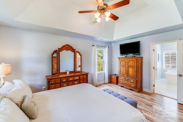 10127 Tallent Ln, Huntersville, NC 28078 - bedroom with light wood finished floors, high vaulted ceiling, baseboards, a ceiling fan, and ensuite bathroom