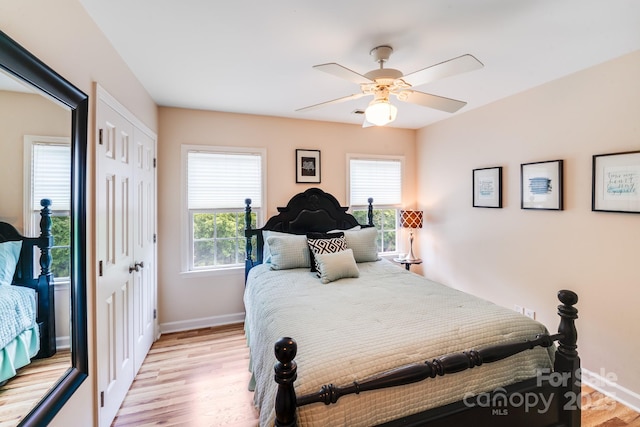 10127 Tallent Ln, Huntersville, NC 28078 - bedroom featuring light wood finished floors and ceiling fan