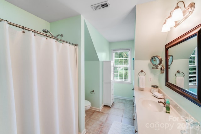 10127 Tallent Ln, Huntersville, NC 28078 - full bathroom featuring vanity, tile patterned flooring, lofted ceiling, and curtained shower