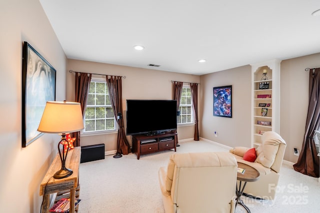 10127 Tallent Ln, Huntersville, NC 28078 - carpeted living area featuring baseboards and recessed lighting