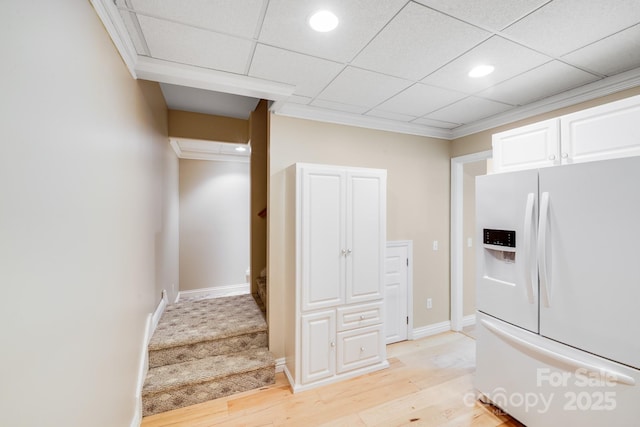 10127 Tallent Ln, Huntersville, NC 28078 - kitchen featuring white refrigerator with ice dispenser, white cabinetry, crown molding, light wood finished floors, and recessed lighting