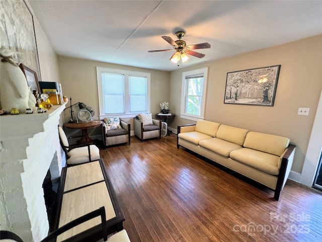 450 1st St SE, Hickory, NC 28602 - living room with wood finished floors, ceiling fan, and baseboards