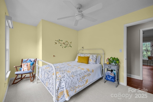 201 Windsor Forest Cir, Fletcher, NC 28732 - carpeted bedroom with baseboards and a ceiling fan