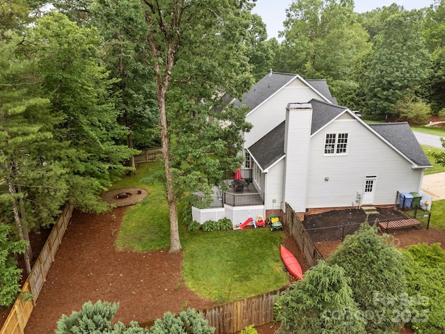 201 Windsor Forest Cir, Fletcher, NC 28732 - view of property exterior with roof with shingles, a fenced backyard, and a sunroom