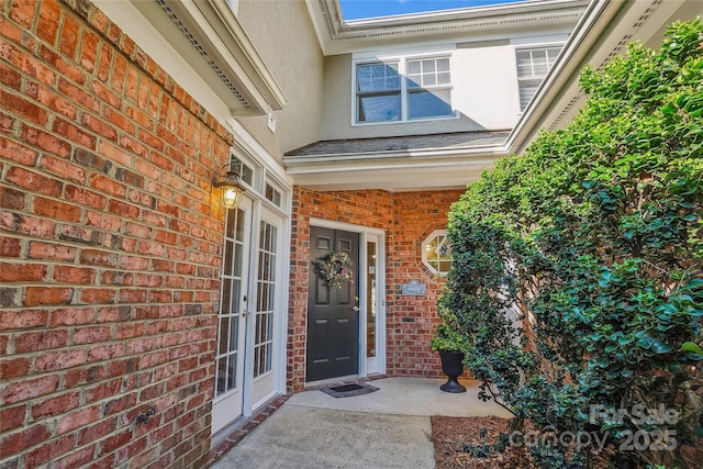11234 Villa Trace Pl, Charlotte, NC 28277 - view of exterior entry with french doors, brick siding, and stucco siding