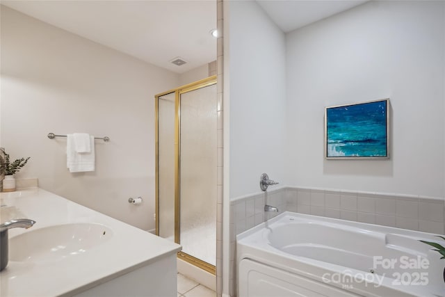 11234 Villa Trace Pl, Charlotte, NC 28277 - bathroom featuring a stall shower, a garden tub, tile patterned flooring, and double vanity
