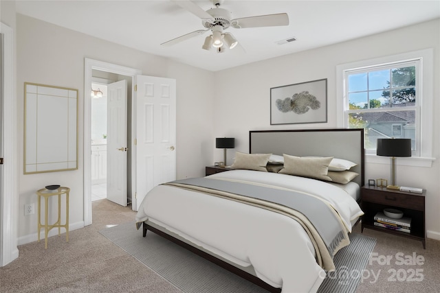 11234 Villa Trace Pl, Charlotte, NC 28277 - bedroom with light carpet, a ceiling fan, and ensuite bath