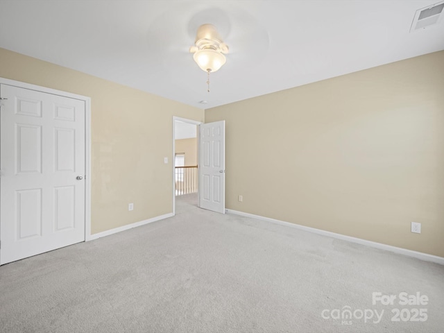 5921 Firethorne Ln, Concord, NC 28025 - unfurnished bedroom with carpet floors and baseboards