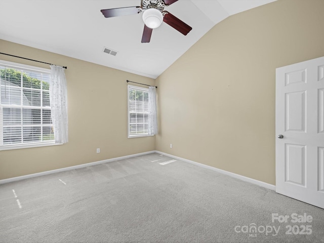 5921 Firethorne Ln, Concord, NC 28025 - spare room with vaulted ceiling, carpet, healthy amount of natural light, ceiling fan, and baseboards