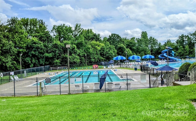 1418 Skidaway St NW Unit 427, Concord, NC 28027 - community pool with a water slide, view of scattered trees, and a patio
