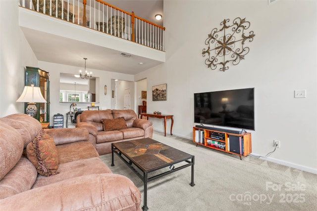 1418 Skidaway St NW Unit 427, Concord, NC 28027 - carpeted living area with a chandelier and a high ceiling