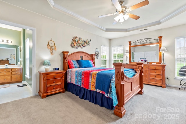 1418 Skidaway St NW Unit 427, Concord, NC 28027 - bedroom with a raised ceiling, ornamental molding, light carpet, a ceiling fan, and ensuite bath