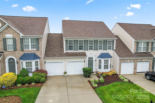 1418 Skidaway St NW Unit 427, Concord, NC 28027 - view of front of home with driveway, a garage, and roof with shingles