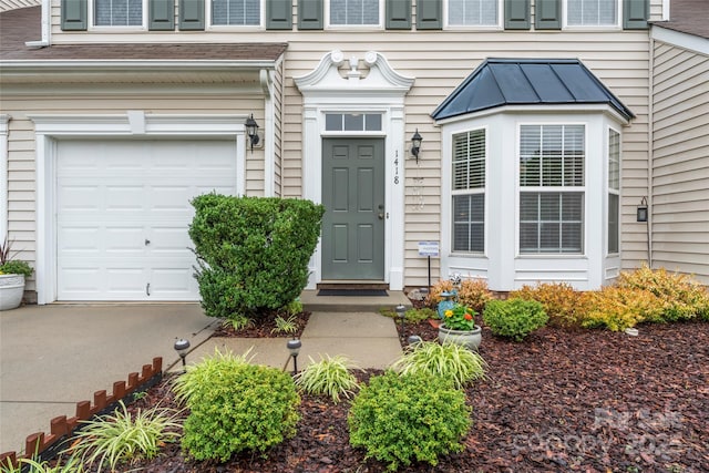 1418 Skidaway St NW Unit 427, Concord, NC 28027 - view of exterior entry featuring an attached garage