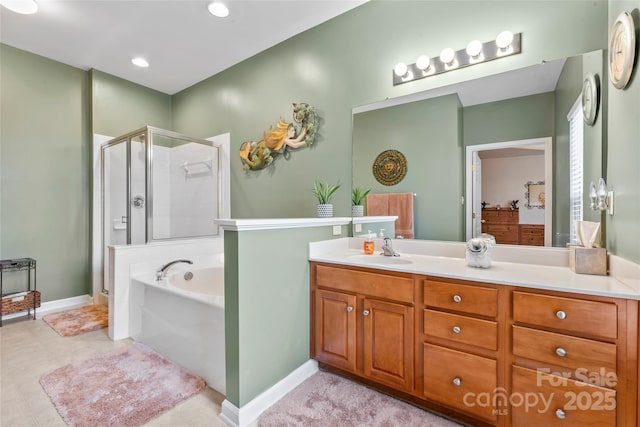 1418 Skidaway St NW Unit 427, Concord, NC 28027 - full bathroom featuring a stall shower, a garden tub, vanity, and recessed lighting