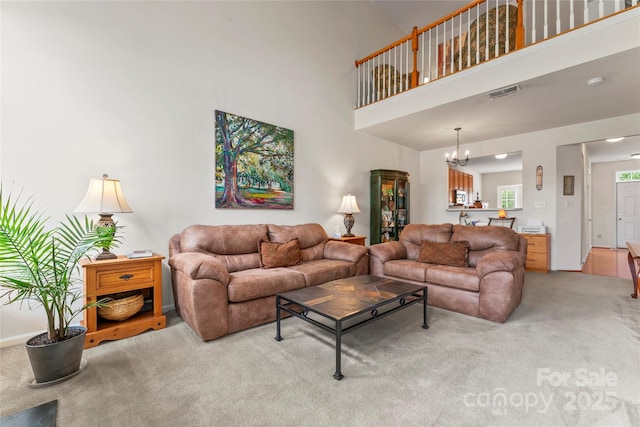 1418 Skidaway St NW Unit 427, Concord, NC 28027 - living area with a chandelier and light carpet