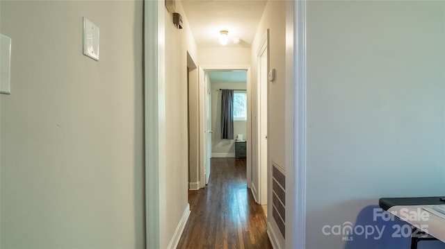 1211 Campus St, Charlotte, NC 28216 - hallway featuring dark wood-type flooring and baseboards