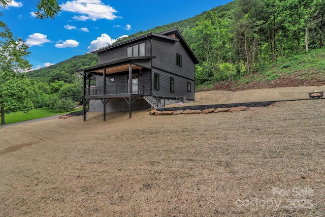 127 View Ridge Parkway, Leicester, NC 28748 - view of front of home featuring a mountain view and a view of trees
