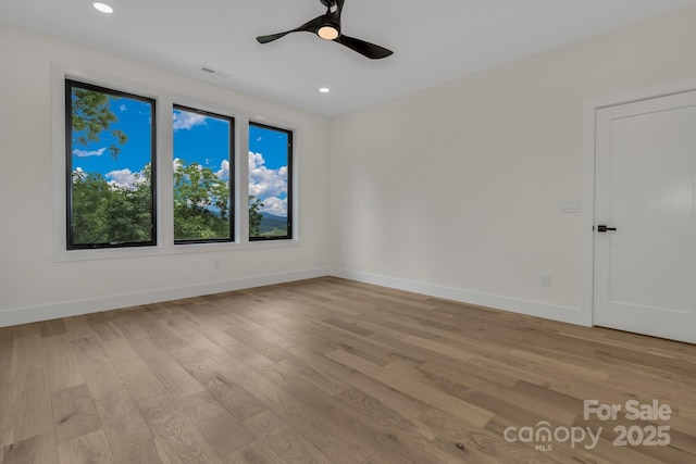 127 View Ridge Parkway, Leicester, NC 28748 - unfurnished room featuring plenty of natural light, light wood finished floors, recessed lighting, and ceiling fan
