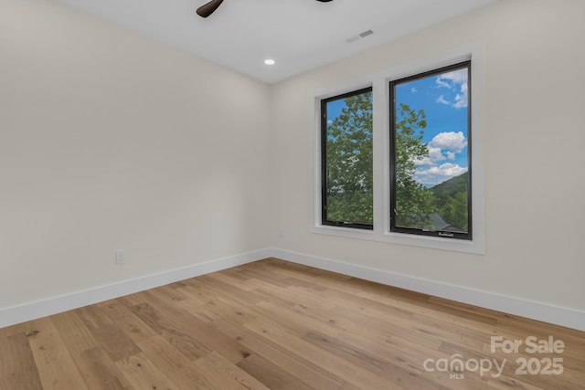 127 View Ridge Parkway, Leicester, NC 28748 - spare room featuring wood finished floors, ceiling fan, and recessed lighting