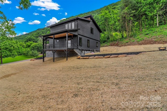 127 View Ridge Parkway, Leicester, NC 28748 - view of front of home with a wooded view and a mountain view