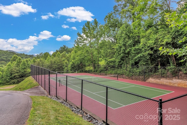 127 View Ridge Parkway, Leicester, NC 28748 - view of tennis court featuring a view of trees