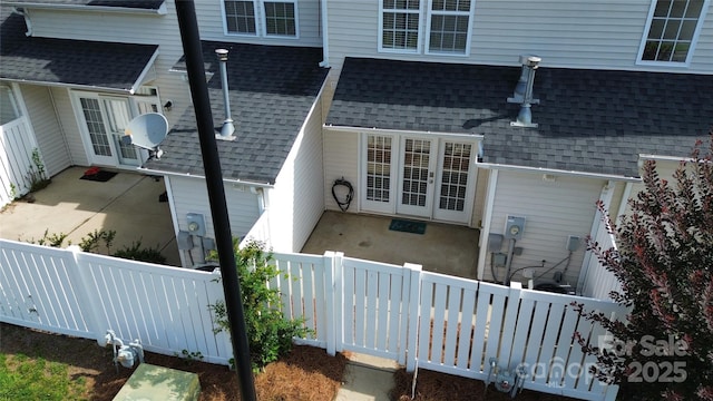 4151 Town Center Rd, Harrisburg, NC 28075 - view of side of property featuring roof with shingles and a patio area