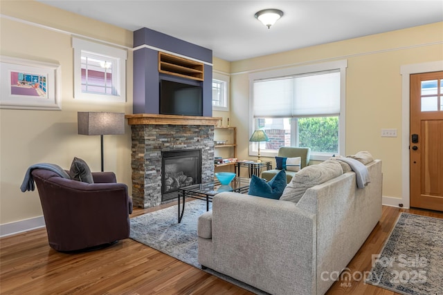26 Byrdcliffe Ln, Asheville, NC 28805 - living area featuring wood finished floors and a fireplace