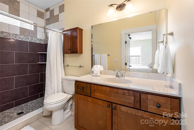26 Byrdcliffe Ln, Asheville, NC 28805 - bathroom with vanity, a tile shower, tile patterned flooring, and ceiling fan