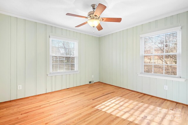 3515 Back Creek Church Rd, Charlotte, NC 28213 - empty room with ornamental molding, wood finished floors, and a ceiling fan