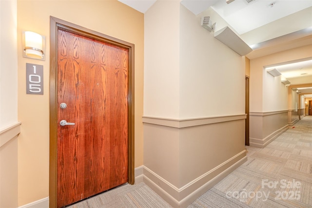 411 W Washington St, Greensboro, NC 27401 - hall with baseboards and light colored carpet