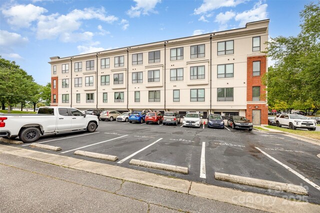 411 W Washington St, Greensboro, NC 27401 - view of building exterior featuring uncovered parking