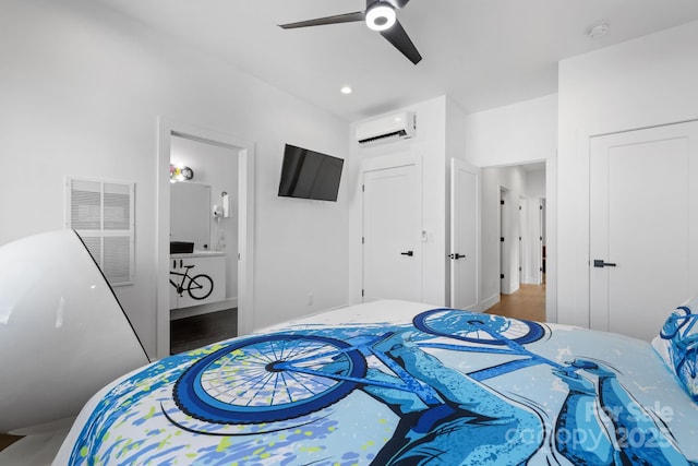28 Carrick Ln, Brevard, NC 28712 - bedroom with an AC wall unit, connected bathroom, and ceiling fan