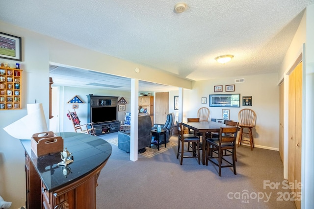 347 Hickory Mountain Rd, Sparta, NC 28675 - dining room featuring carpet flooring and a textured ceiling