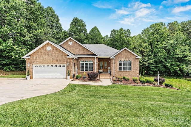 1616 Indian Springs Dr NW, Conover, NC 28613 - single story home with concrete driveway, an attached garage, a front lawn, and brick siding