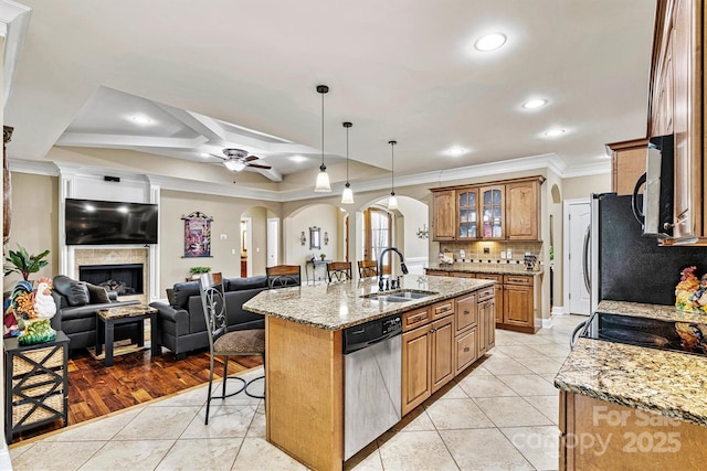 1616 Indian Springs Dr NW, Conover, NC 28613 - kitchen with a sink, arched walkways, a kitchen breakfast bar, ornamental molding, and a ceiling fan