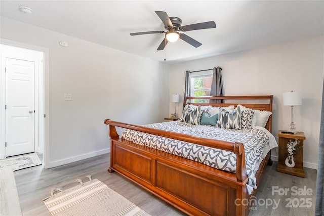 2116 Eastway Dr, Charlotte, NC 28205 - bedroom featuring light wood-style floors, baseboards, and ceiling fan