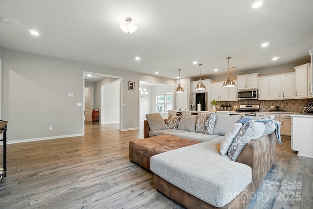 18619 Mainsail Ct, Lancaster, SC 29720 - living area featuring light wood-type flooring, recessed lighting, and baseboards