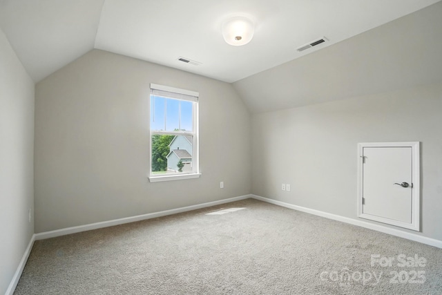 18619 Mainsail Ct, Lancaster, SC 29720 - additional living space with vaulted ceiling, carpet, and baseboards