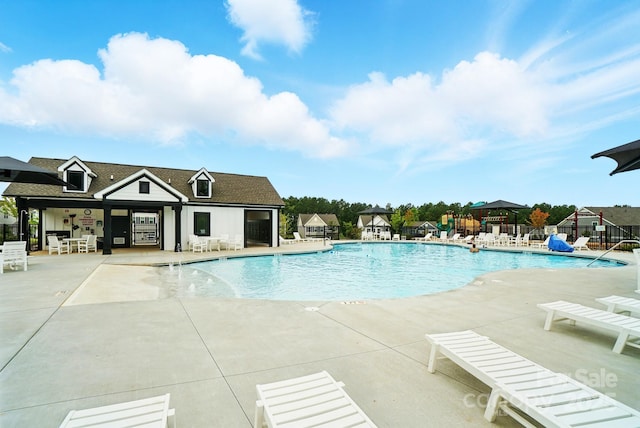 18619 Mainsail Ct, Lancaster, SC 29720 - community pool featuring a patio area