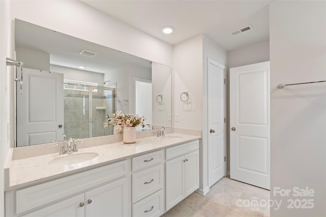 17637 Snug Harbor Rd, Charlotte, NC 28278 - bathroom featuring a shower stall, double vanity, and tile patterned flooring
