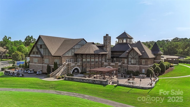 17637 Snug Harbor Rd, Charlotte, NC 28278 - back of house featuring a patio area, a lawn, a chimney, and a balcony