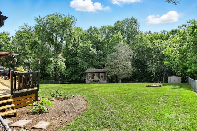 5378 Westwood Dr, Granite Falls, NC 28630 - view of yard with a wooden deck, a shed, and view of scattered trees