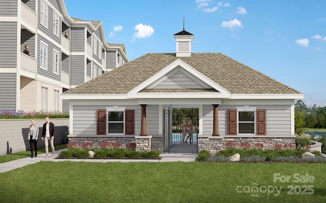 4455 Reed Creek Dr Unit 101, Sherrills Ford, NC 28673 - view of front of home featuring a front lawn, stone siding, a shingled roof, and a porch
