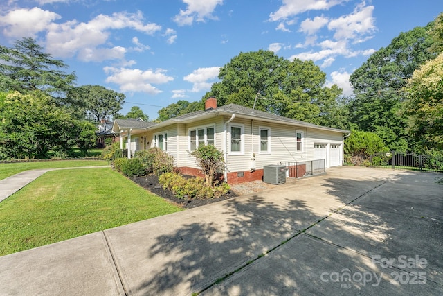 1107 Fairfield Dr, Gastonia, NC 28054 - view of side of home with central AC unit, a chimney, crawl space, concrete driveway, and a shingled roof