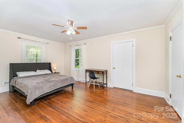1107 Fairfield Dr, Gastonia, NC 28054 - bedroom featuring wood finished floors, baseboards, crown molding, and ceiling fan